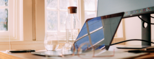 Photo of an office desk with laptop.